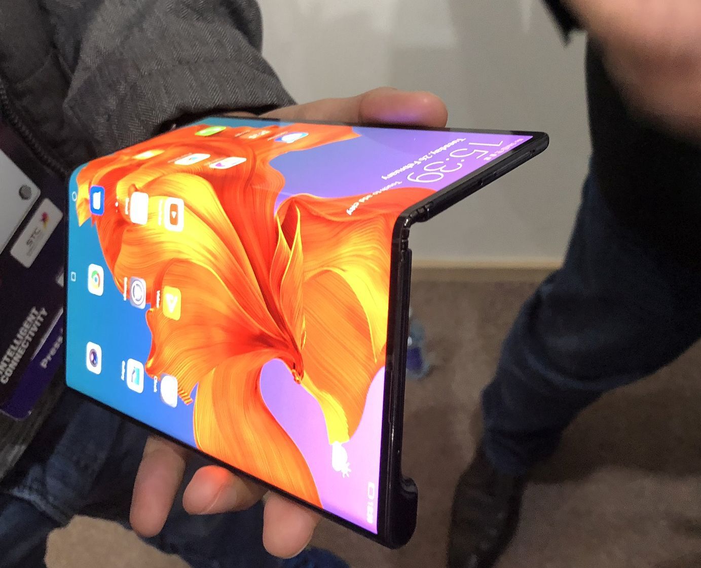 Artistic representation of Huawei's success in the foldable phone market, featuring a modern foldable smartphone and a vibrant tech marketplace.