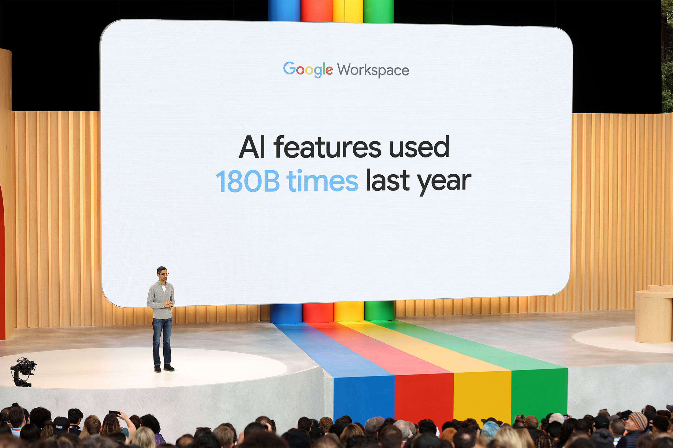 Illustration of Google I/O 2025 tech conference with a vibrant audience and futuristic stage.