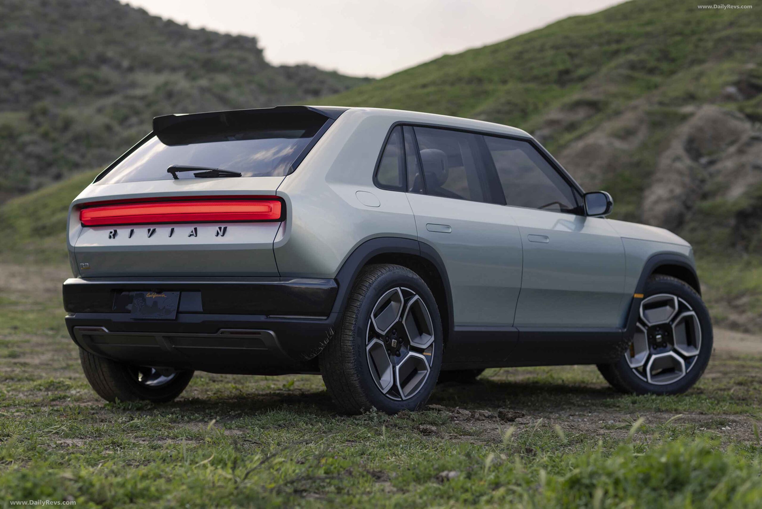 A modern visual representation of Rivian's positive gross profit for 2024, featuring a sleek electric vehicle and futuristic financial elements.