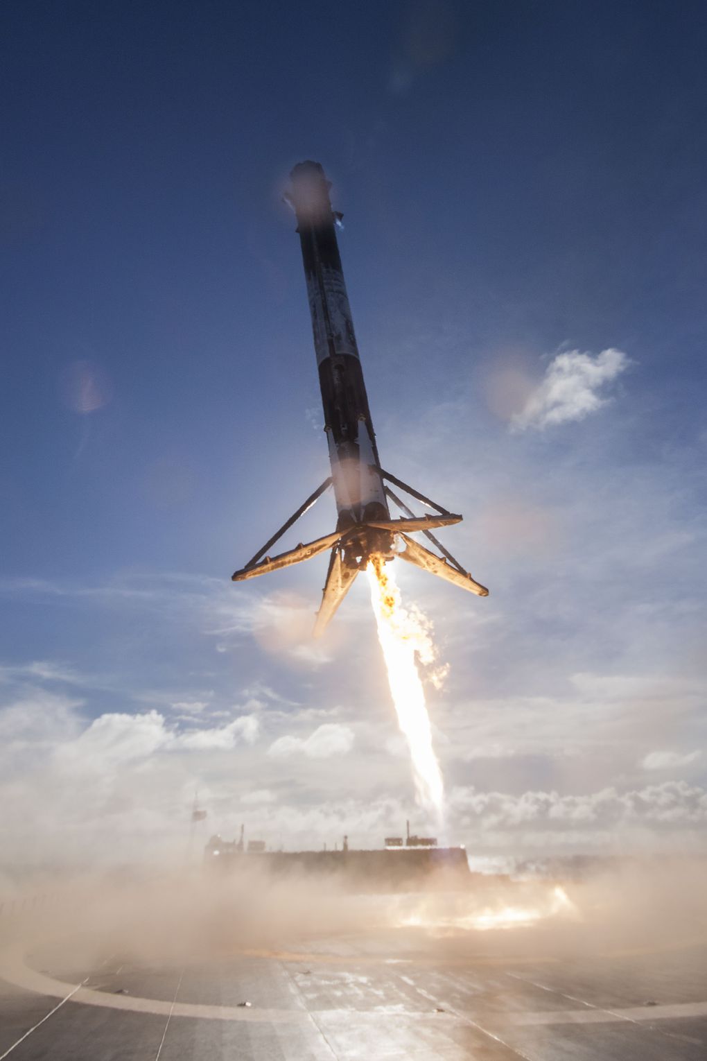 Falcon 9 rocket launching into a vibrant twilight sky, showcasing SpaceX's advancements in space technology.