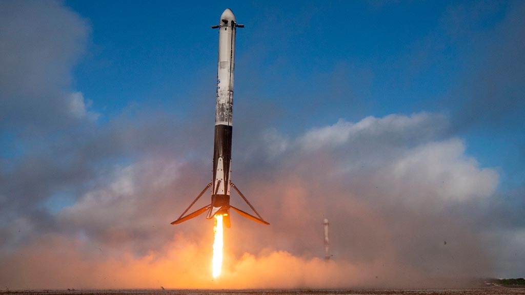 A stunning visual of the Falcon 9 rocket launching with Starlink satellites in the background, showcasing modern space technology.